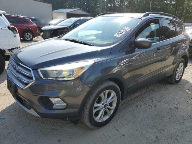FORD ESCAPE SE 2017 with VIN 1FMCU0G90HUE65982 - Photo from auction
