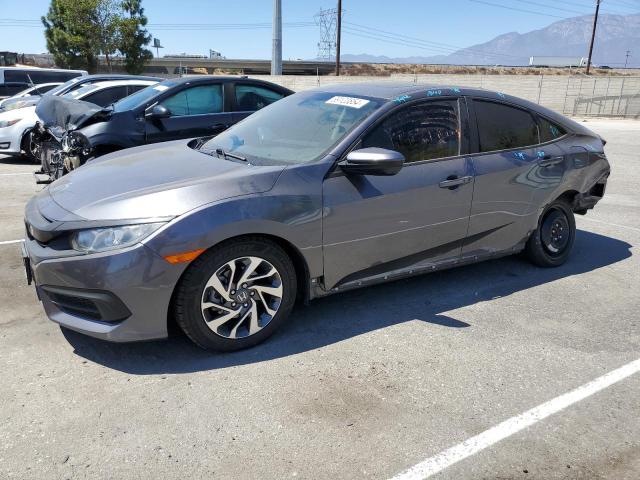 HONDA CIVIC EX 2018 with VIN 2HGFC2F79JH532895 - Photo from auction