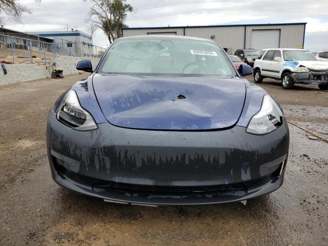 Photo 5 from auction – 2019 TESLA MODEL 3 with VIN 5YJ3E1EB7KF477513