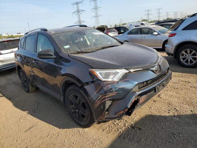 Photo 4 from auction – 2017 TOYOTA RAV4 LE with VIN JTMBFREV7HJ170779