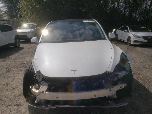 Photo 5 from auction – 2022 TESLA MODEL Y with VIN 7SAYGDEF3NF560996