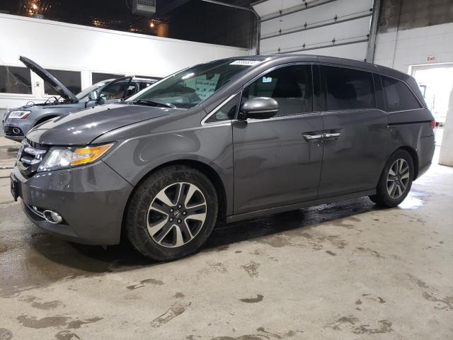 HONDA ODYSSEY TO 2014 with VIN 5FNRL5H93EB010870 - Photo from auction