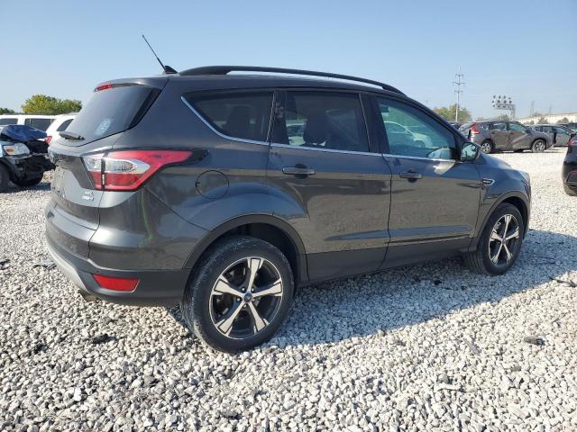 Photo 3 from auction – 2018 FORD ESCAPE SEL with VIN 1FMCU9HD9JUD01658