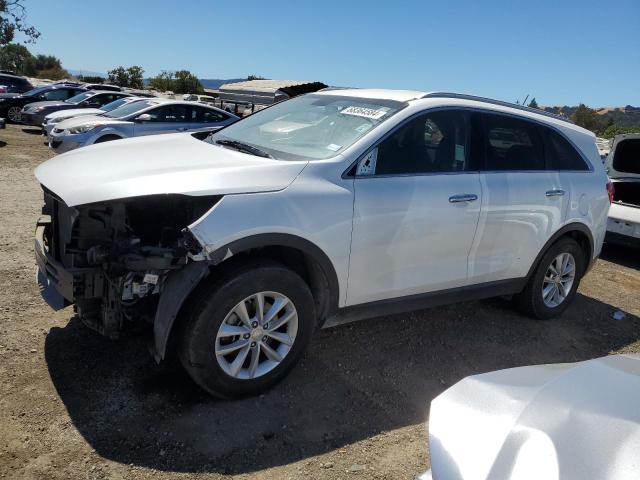 KIA SORENTO LX 2016 with VIN 5XYPG4A34GG176337 - Photo from auction