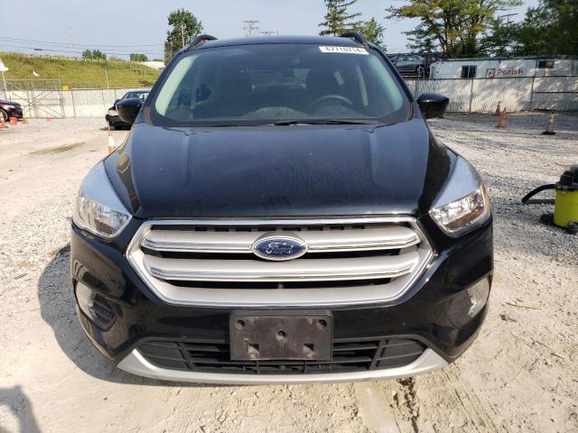 Photo 5 from auction – 2018 FORD ESCAPE SE with VIN 1FMCU0GD7JUC52716