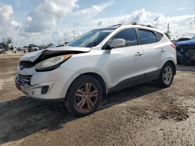 HYUNDAI TUCSON GLS 2012 with VIN KM8JUCAC0CU401849 - Photo from auction