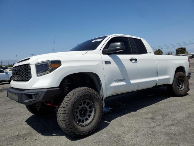 TOYOTA TUNDRA DOU 2014 with VIN 5TFTY5F11EX008240 - Photo from auction