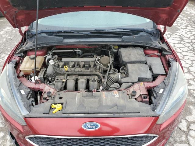 Photo 11 from auction – 2015 FORD FOCUS SE with VIN 1FADP3F24FL358545