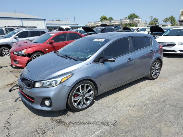 KIA FORTE EX 2017 with VIN 3KPFN5A32HE140569 - Photo from auction