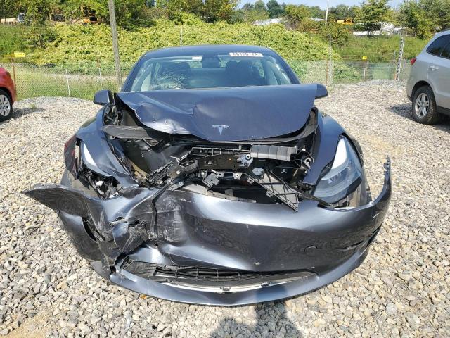 Photo 5 from auction – 2021 TESLA MODEL 3 with VIN 5YJ3E1EA8MF994684