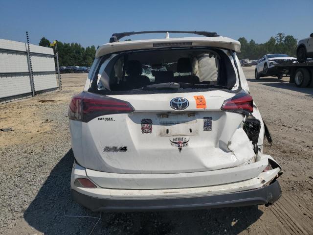 Photo 6 from auction – 2017 TOYOTA RAV4 LE with VIN JTMZFREV4HJ128519