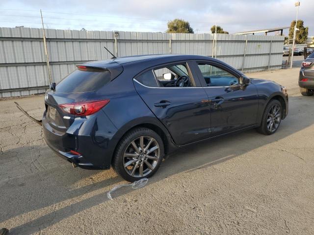 Photo 3 from auction – 2018 MAZDA 3 TOURING with VIN 3MZBN1L38JM228622