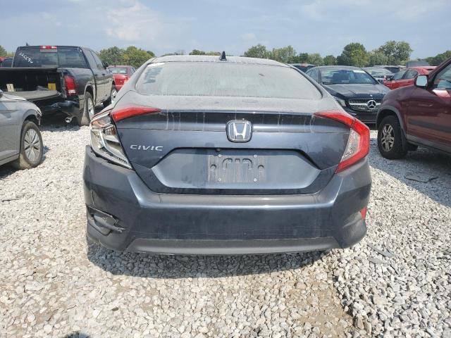 Photo 6 from auction – 2018 HONDA CIVIC EX with VIN 19XFC2F72JE031664