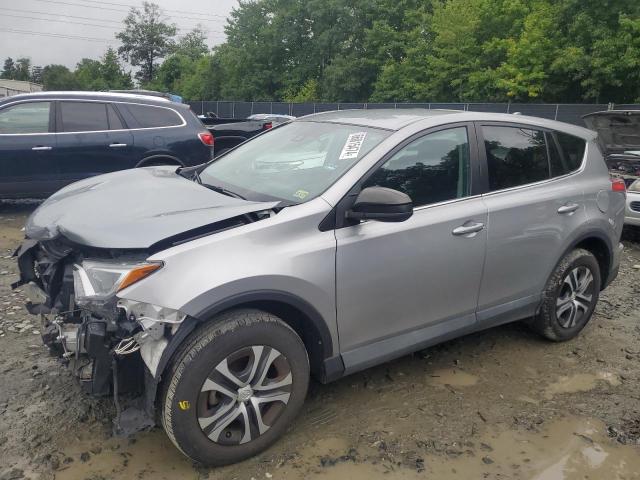 TOYOTA RAV4 LE 2018 with VIN 2T3BFREV6JW762049 - Photo from auction