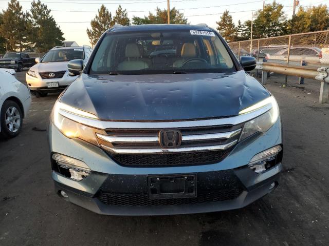 Photo 5 from auction – 2017 HONDA PILOT EXL with VIN 5FNYF6H57HB048578