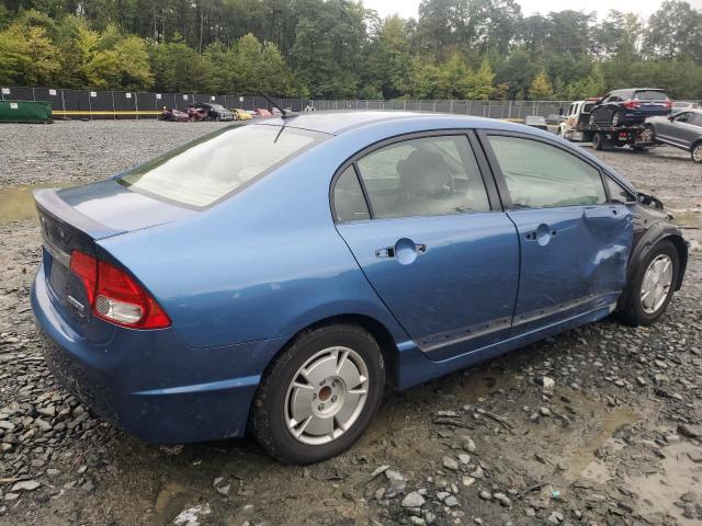 Photo 3 from auction – 2010 HONDA CIVIC HYBR with VIN JHMFA3F20AS003504