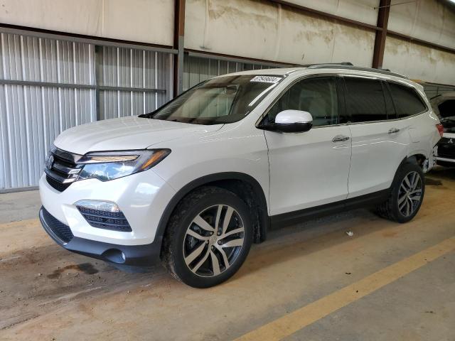 HONDA PILOT TOUR 2017 with VIN 5FNYF6H98HB058166 - Photo from auction