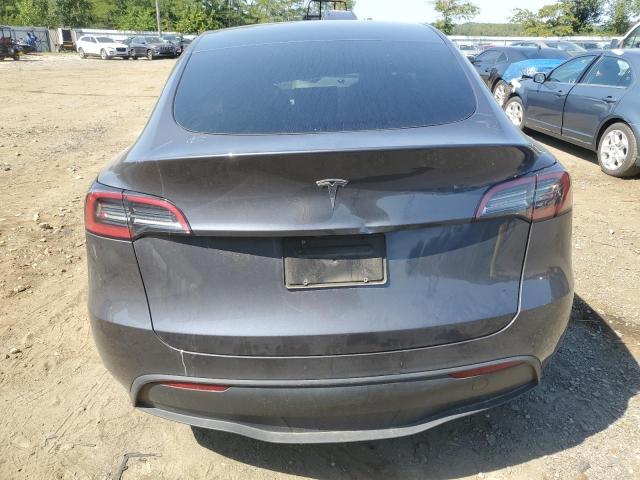 Photo 6 from auction – 2023 TESLA MODEL Y with VIN 7SAYGDED6PF930615