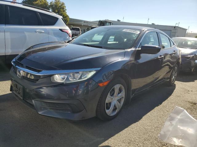 HONDA CIVIC LX 2018 with VIN 2HGFC2F52JH526449 - Photo from auction
