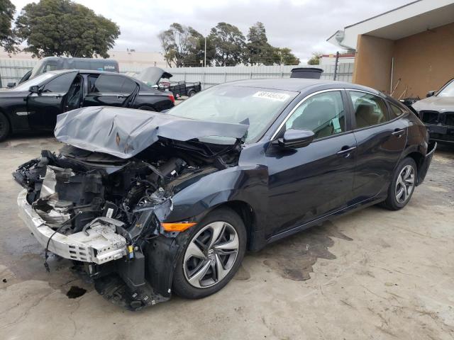 HONDA CIVIC LX 2019 with VIN 2HGFC2F62KH582028 - Photo from auction