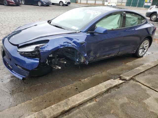 TESLA MODEL 3 2022 with VIN 5YJ3E1EA8NF189673 - Photo from auction