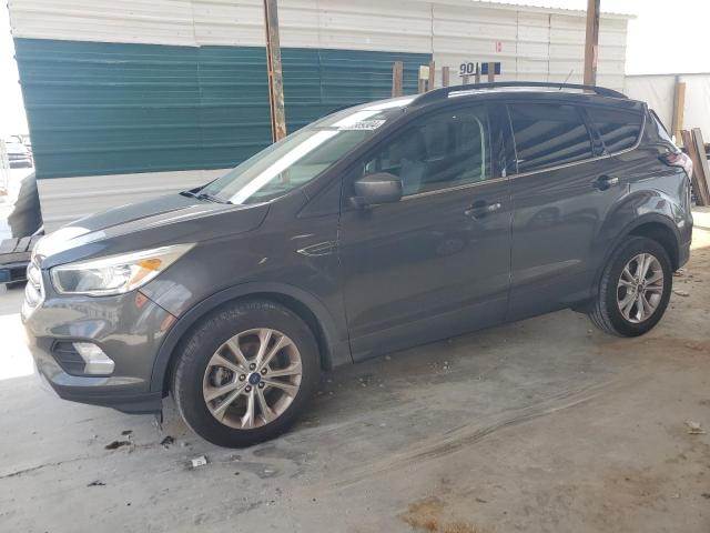 FORD ESCAPE SE 2018 with VIN 1FMCU0GD7JUA65587 - Photo from auction