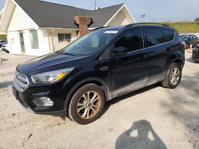 FORD ESCAPE SE 2018 with VIN 1FMCU0GD7JUC52716 - Photo from auction