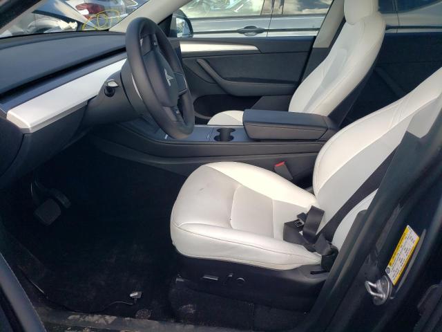 Photo 7 from auction – 2023 TESLA MODEL Y with VIN 7SAYGAEE6PF661104