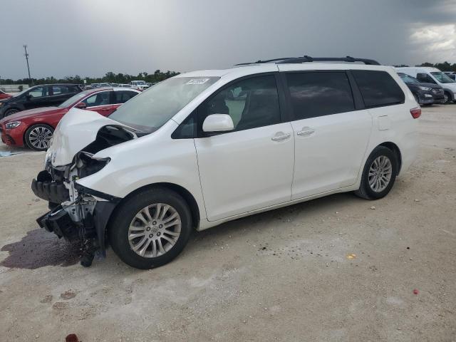 TOYOTA SIENNA XLE 2016 with VIN 5TDYK3DC9GS698487 - Photo from auction