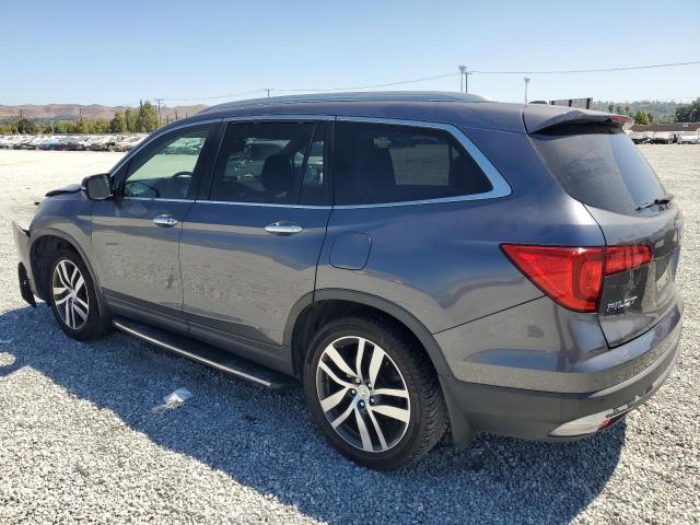Photo 2 from auction – 2016 HONDA PILOT ELIT with VIN 5FNYF6H04GB045253