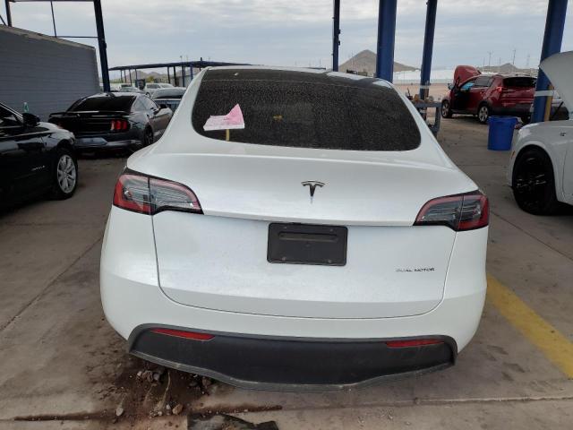 Photo 6 from auction – 2023 TESLA MODEL Y with VIN 7SAYGDEE6PF858274