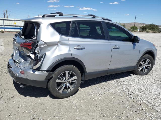 Photo 3 from auction – 2017 TOYOTA RAV4 XLE with VIN 2T3RFREV8HW610671