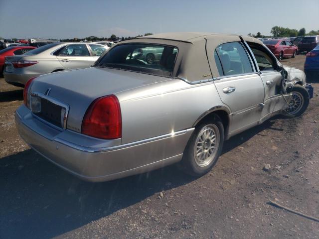 Photo 3 from auction – 2004 LINCOLN TOWN CAR E with VIN 1LNHM81W54Y626929