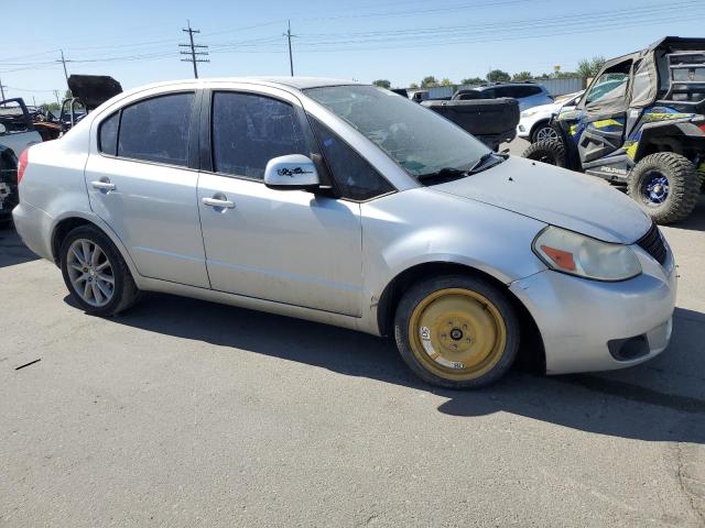 Photo 4 from auction – 2011 SUZUKI SX4 LE with VIN JS2YC5A24B6302226