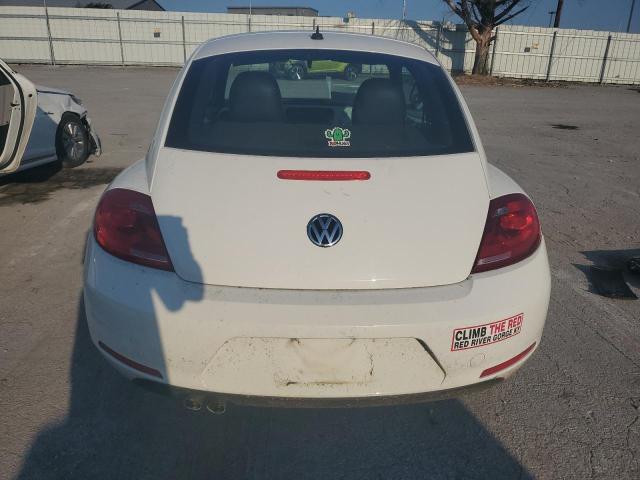 Photo 6 from auction – 2013 VOLKSWAGEN BEETLE with VIN 3VWJP7AT0DM670052
