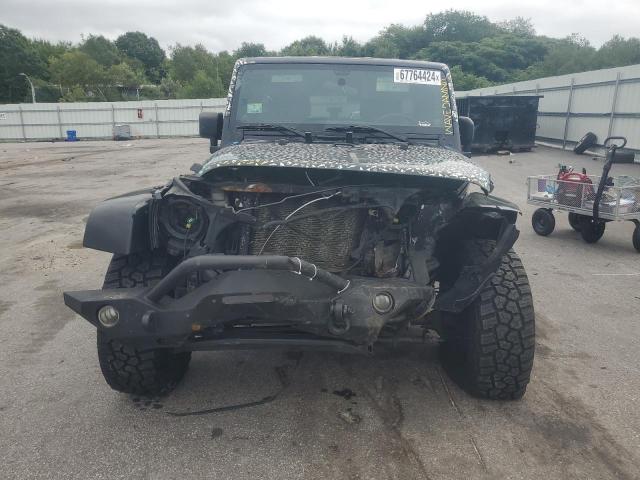 Photo 5 from auction – 2011 JEEP WRANGLER U with VIN 1J4BA5H10BL625543