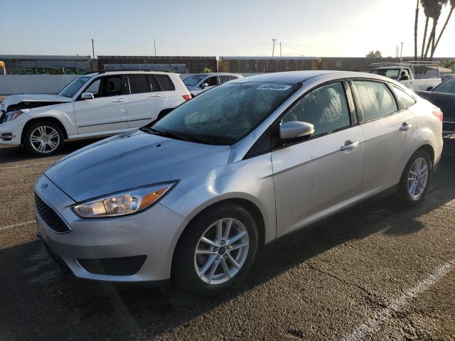 FORD FOCUS SE 2017 with VIN 1FADP3F29HL298992 - Photo from auction