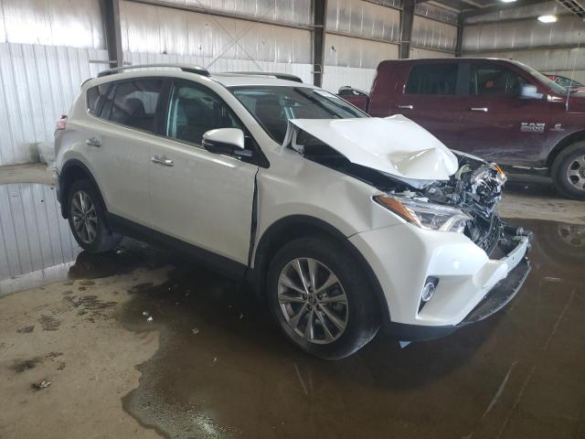 Photo 4 from auction – 2018 TOYOTA RAV4 LIMIT with VIN 2T3DFREV8JW748047