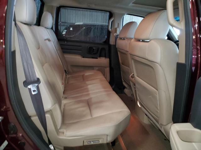 Photo 10 from auction – 2010 HONDA RIDGELINE with VIN 5FPYK1F52AB012246