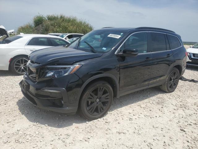 HONDA PILOT SE 2022 with VIN 5FNYF6H20NB056667 - Photo from auction