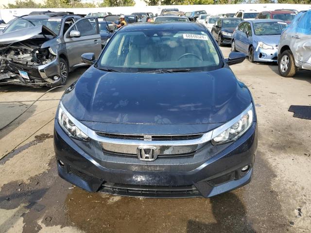 Photo 5 from auction – 2018 HONDA CIVIC EX with VIN JHMFC1F42JX013616