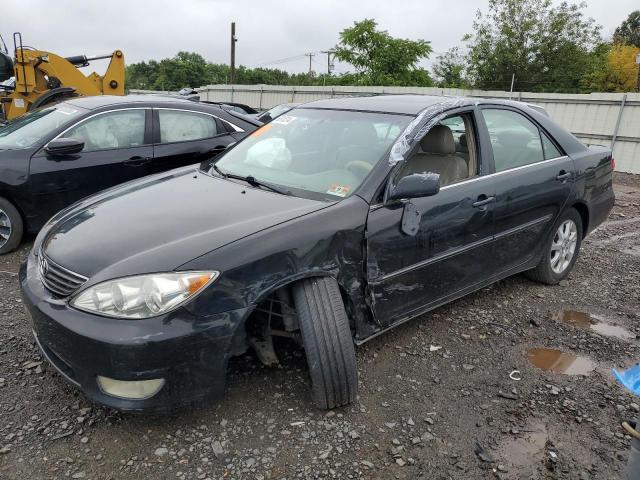 TOYOTA CAMRY LE 2005 with VIN 4T1BF30K95U088620 - Photo from auction