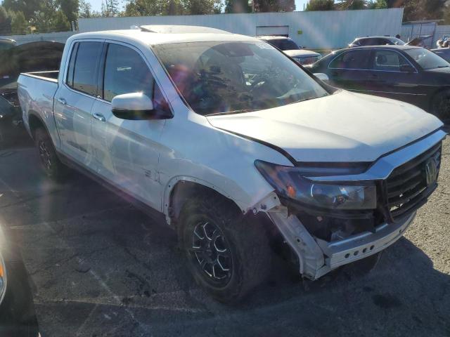 Photo 4 from auction – 2021 HONDA RIDGELINE with VIN 5FPYK3F75MB026093