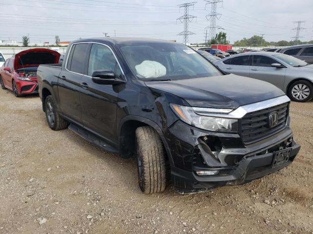 Photo 4 from auction – 2023 HONDA RIDGELINE with VIN 5FPYK3F58PB010196