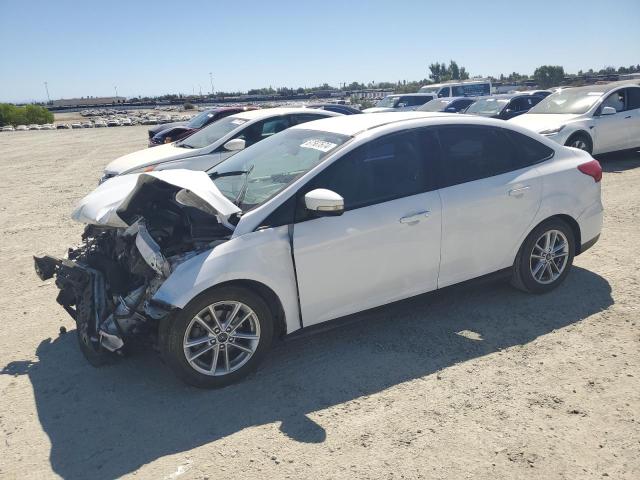 FORD FOCUS SE 2015 with VIN 1FADP3F24FL300807 - Photo from auction