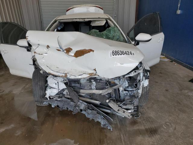 Photo 11 from auction – 2021 TOYOTA COROLLA LE with VIN 5YFEPMAE0MP146929