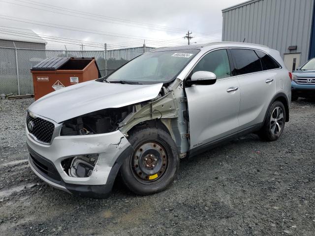 KIA SORENTO EX 2016 with VIN 5XYPHDA54GG023617 - Photo from auction