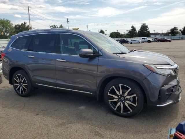 Photo 4 from auction – 2022 HONDA PILOT TOUR with VIN 5FNYF6H64NB034545