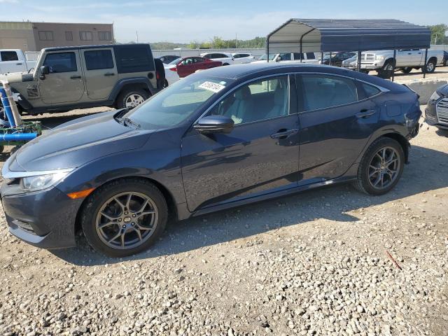 HONDA CIVIC LX 2018 with VIN 19XFC2F52JE019819 - Photo from auction