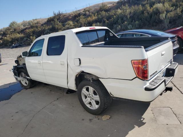 Photo 2 from auction – 2014 HONDA RIDGELINE with VIN 5FPYK1F59EB005767